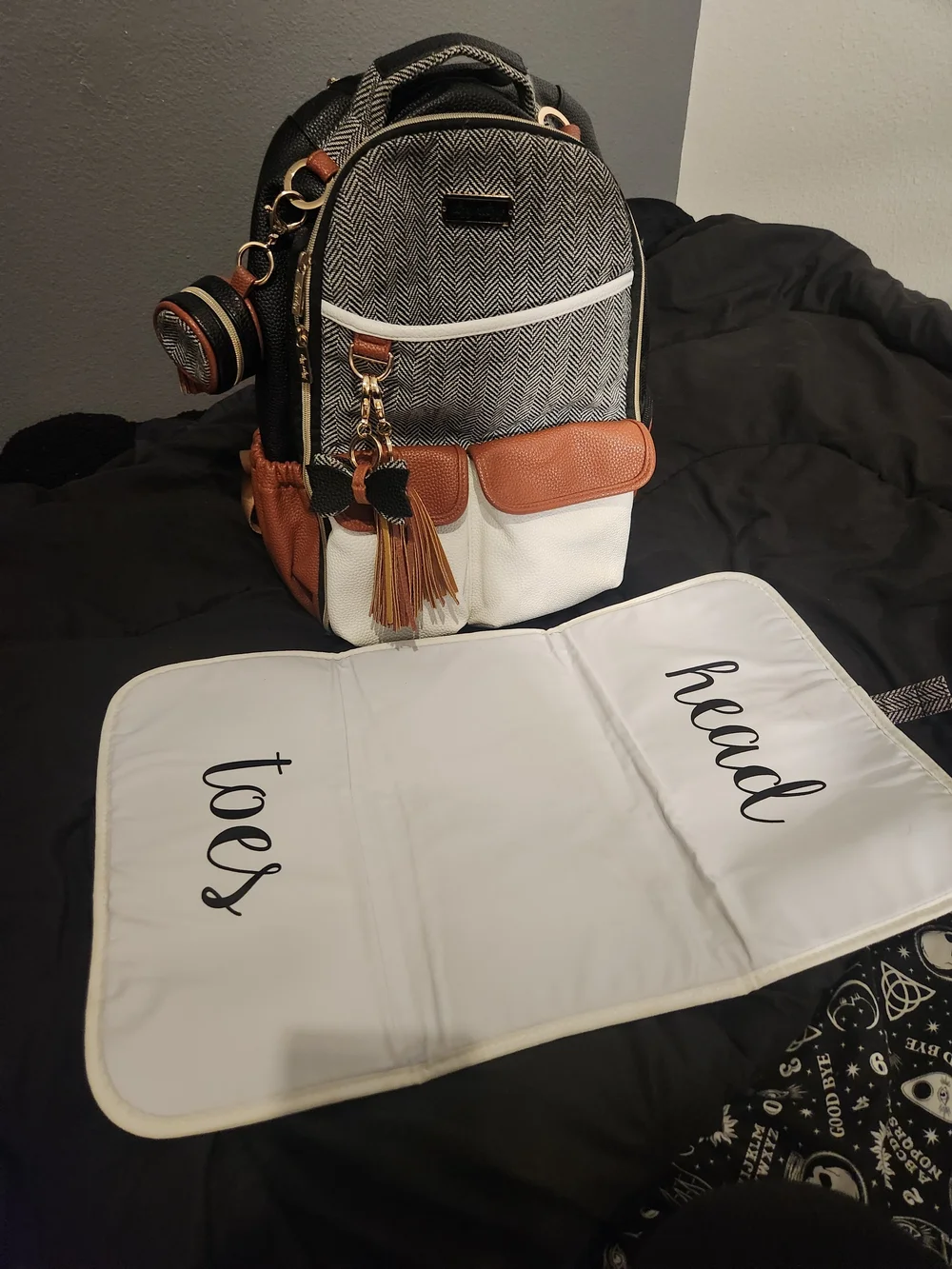 Itzy Ritzy Herringbone Diaper Backpack in Black, White & Brown